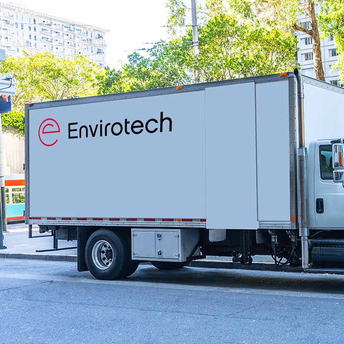 White box truck with the Envirotech logo on the side.